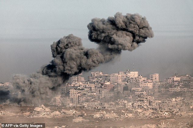 Natan was killed while fighting in Gaza in June. Pictured: Smoke billows during an Israeli strike on the Gaza Strip earlier this week