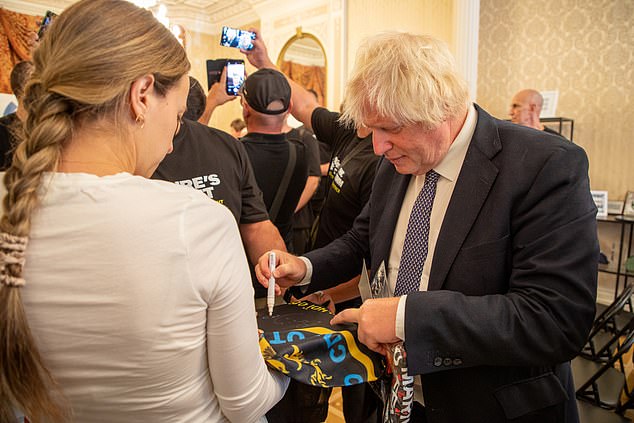 Boris Johnson at the Ukrainian Embassy in London where he met veterans of the war in Ukraine