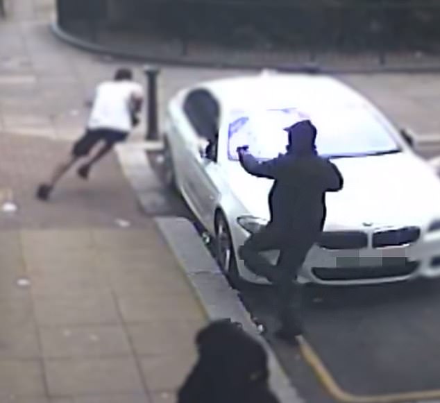Further images show that after killing Rene, the shooter chased down a second victim in the middle of a busy street