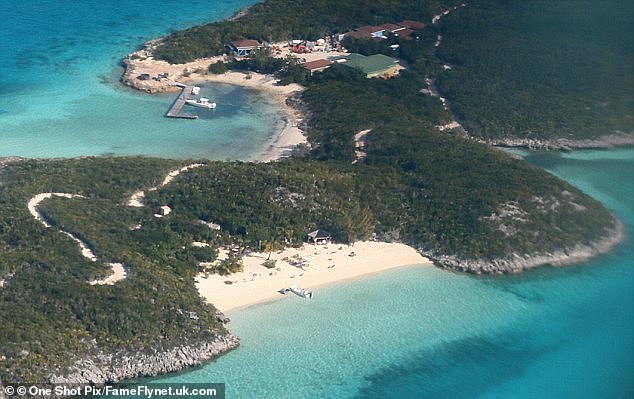 Johnny and Amber's wedding was held on Little Halls Pond Cay (above) - Johnny's private island on the Bahamas