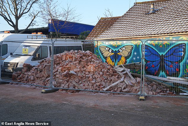 Witnesses said police struggled to identify the make and model of the car, such was its state after the crash (pictured: rubble gathered at the side of the crash site)
