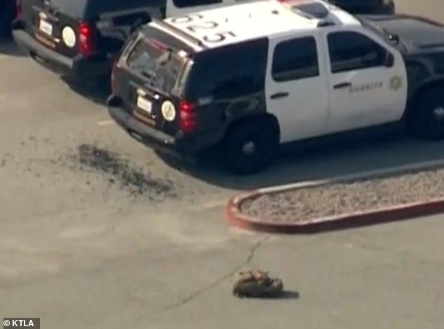 Aerial footage showed an LASD vehicle with a shattered rear windshield, and a backpack could be seen nearby