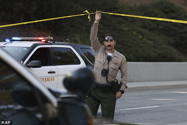 An employee at the training center reportedly said that they initially believed the explosion was an earthquake due to its force. A sheriff's deputy is pictured at the scene on Friday