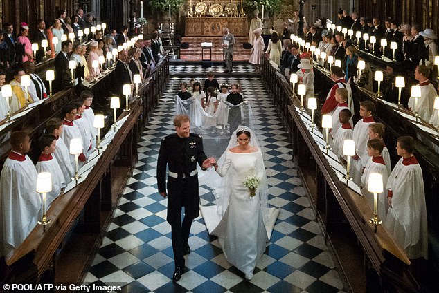 Harry and Meghan leaving St George's Chapel as husband and wife. The Queen told Liza that Meghan's dress was 'too white' for a divorcee