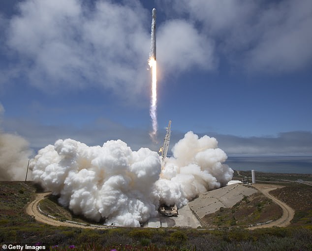 According to local media, Elon Musk's company launched its Falcon 9 rocket just before 9pm (pictured: Vandenberg Air Force Base in California in May 2018)
