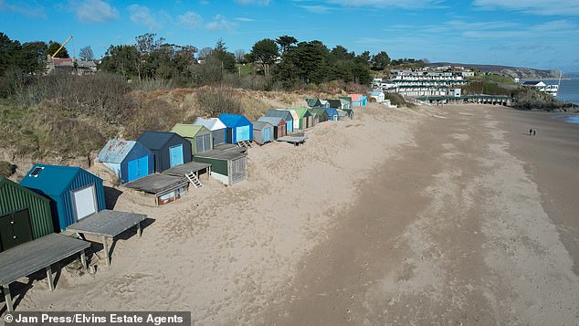Last year, one of Britain's most expensive beach huts sold for £485,000. The turquoise-coloured shed on Mudeford Sandbank in Christchurch, Dorset, measured just 215 sq ft. This means the hut was worth £2,255.81 per sq ft. A square inch in the hut cost £15.60. Pictured: Abersoch beach
