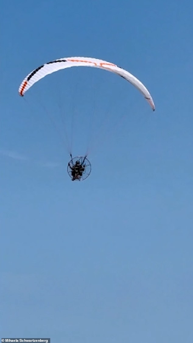 In a somber video posted by Ms Radulescu, Baumgartner is seen taking off into the sky on his final flight