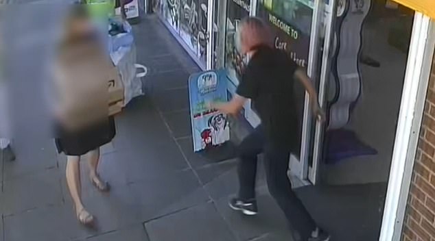 PICTURED: A member of Andrew's staff gives chase after a shoplifter leaves the store