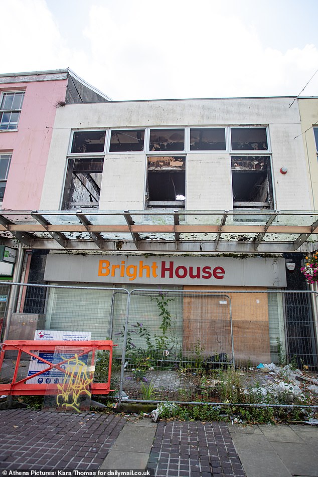 A burnt out shop - police have not provided an official explanation as to the cause but locals said it was part of a wider pattern of cannabis farms being burnt to the ground