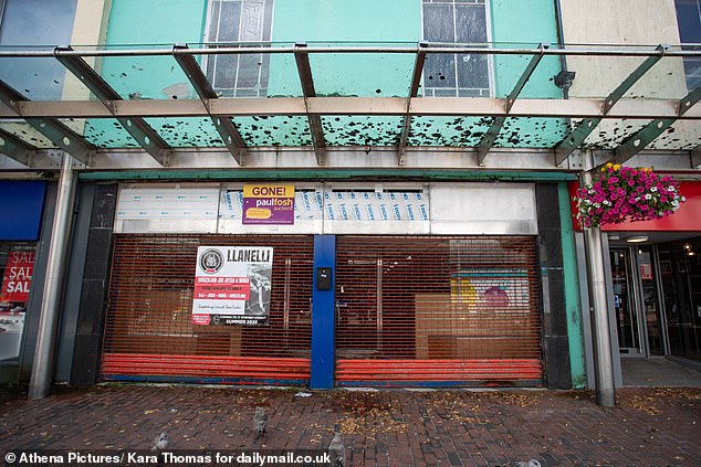 Another shop up for auction next door to Shoezone and just down from a burnt-out unit