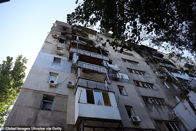 Pictured: A residential building in Odesa that was destroyed overnight in a Russian strike