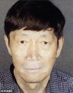 Guojun Xuan, 65, (pictured) was charged with child endangerment after one of the children suffered injuries in May, but has not been charged over the large number of surrogate children
