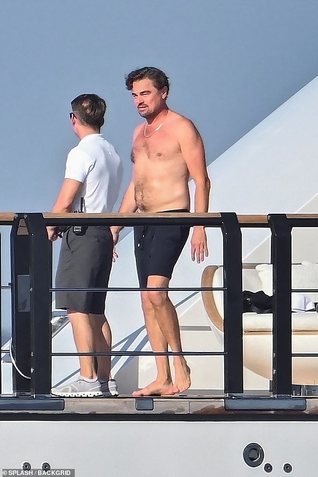 The Titanic star was spotted shirtless aboard a yacht while savoring a lavish day at sea in Saint Tropez with the bikini-clad model