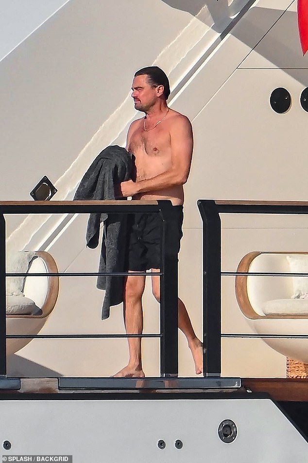 After taking a refreshing dip in the water, he was seen dripping wet on board the yacht, dressed in a pair of dark swim shorts