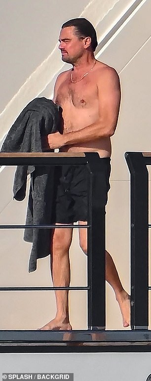 The actor dried off with a grey towel