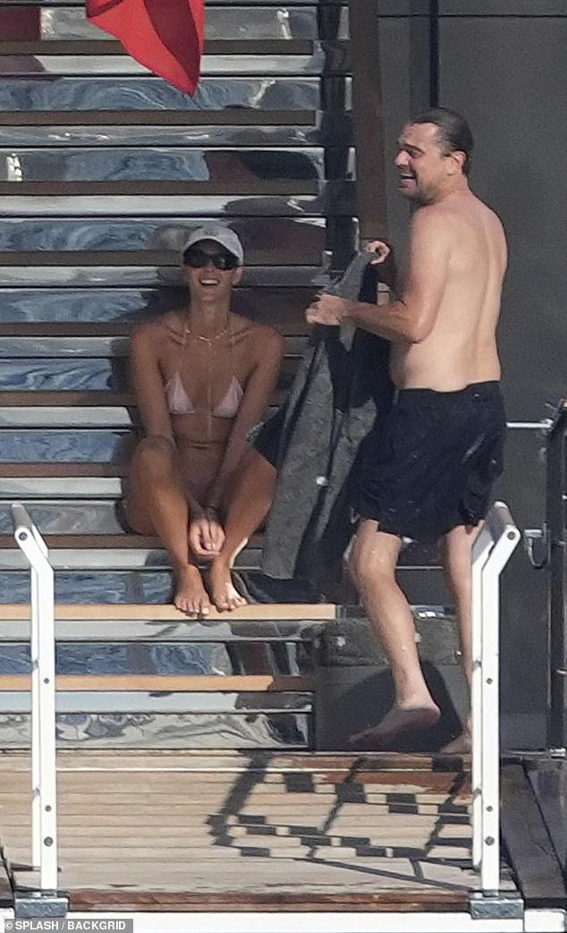 The pair laughed it up while soaking up the sun