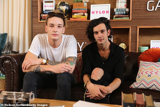 They met as teenagers in high school and went on to form one of the biggest bands of their generation, The 1975, alongside Adam Hann and Ross MacDonald (pictured in 2014)