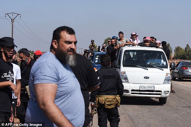 After a ceasefire failed to put an end to clashes between Bedouin tribes and Druze-linked militias, Mr Lammy said he was 'horrified by the violence in Southern Syria'. Pictured: Syrian government security forces at a checkpoint as groups of Bedouin tribal fighters try to reach the city of Sweida on July 19