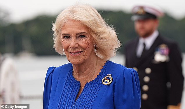 Some might consider the personalised clingfilm dispenser HMS Astute given to Queen Camilla (pictured visiting HMNB Devonport in Plymouth this week to mark the end of the submarine's first commission) for her 78th birthday a little odd