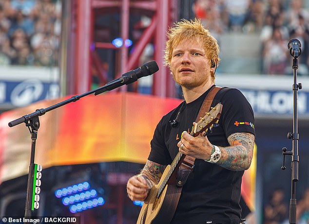 Want to dress like Ed Sheeran? I'm told the pop star (pictured performing last month) donates his old clothes to the East Anglia Children's Hospice shop in Framlingham, Suffolk