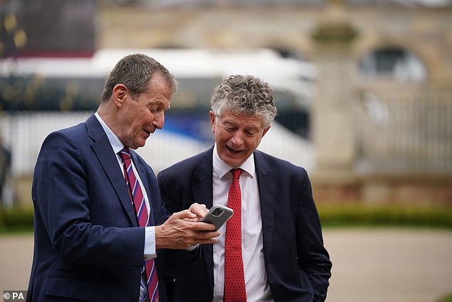 Mr Powell's time with spin chief Alastair Campbell (left) ranged from the highs of the Good Friday Agreement in 1998 to the lows of the Iraq War and the publication of the 'dodgy dossier' justifying military action on the grounds that Saddam Hussein possessed Weapons of Mass Destruction
