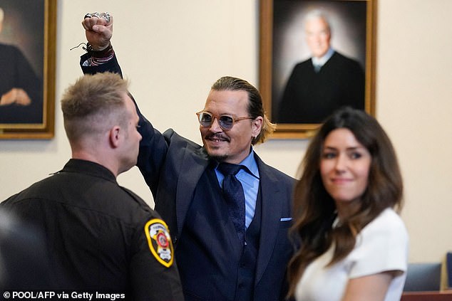 Ever since the jury ruled in favor of Depp the actor has forged a 'comeback' which has been subjected to debates and ridicule (Depp gestures to spectators in court after closing arguments at the Depp vs Heard trial in 2022)