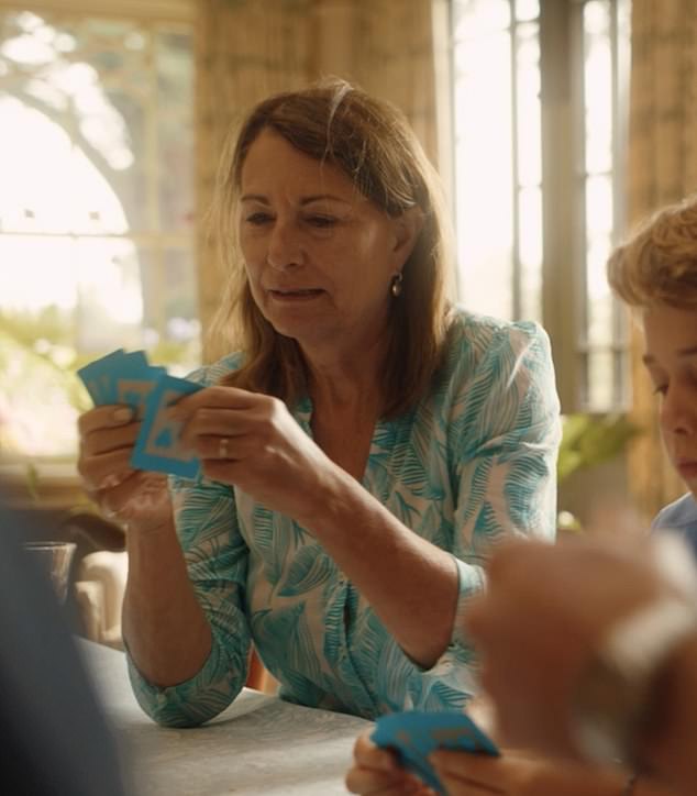 Carole playing cards with her grandchildren. The grandmother featured in the Princess of Wales' video announcing she had finished chemotherapy