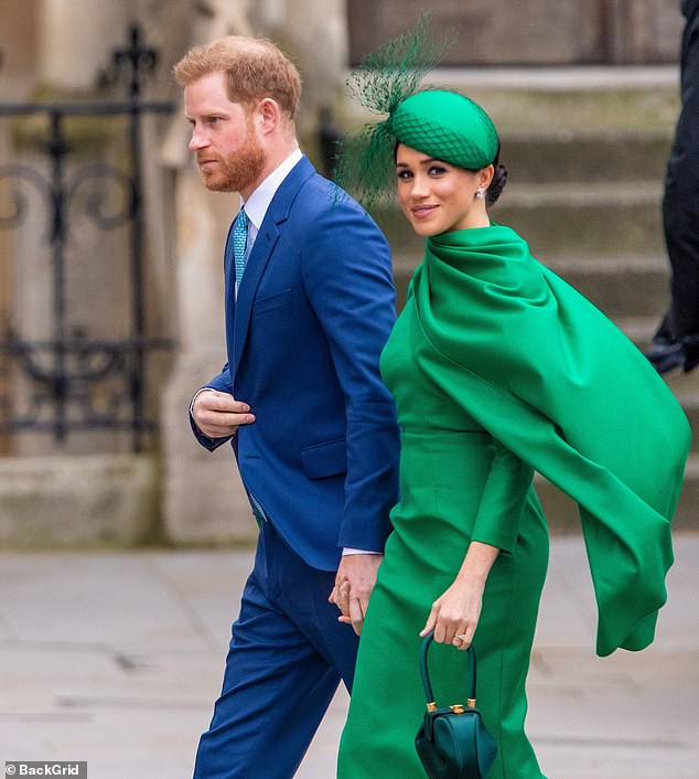Harry and Meghan at their last event as working royals. Royal author Valentine Low claims that Meghan's desire to 'earn money for herself' led the couple to abandon their duties entirely