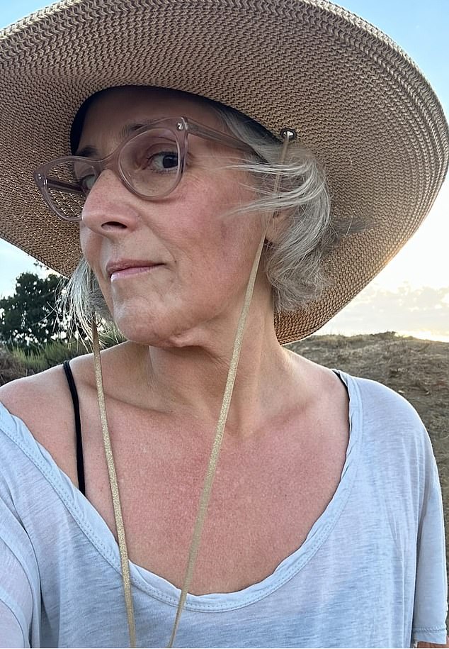 She explained that she 'had lost 40 lbs and did not like the extra skin that hung from below my chin,' letting fans get a glimpse of 'the area I disliked'