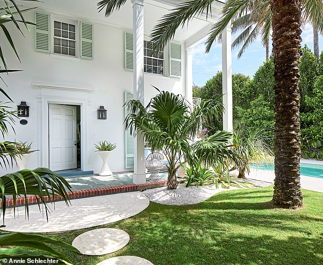 The ‘doll’s house’ façade of Jonathan’s home was designed by renowned Swiss architect Maurice Fatio. The stepping stones add a fun 60s touch.