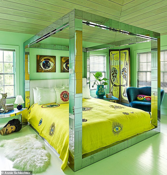 The eye-catching chrome bed in the guest room is a collectible by the innovative mid-century designer Paul Evans. Beside it, on the floor, is a papier-mâché bust of Prince from a window display at Barneys. The bed linen is by Jonathan Adler.