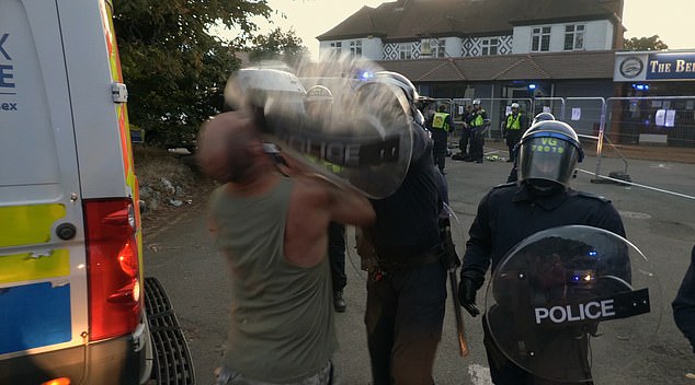 Footage of the encounter shows the man in a grey vest square up to an officer before he is hit with full force
