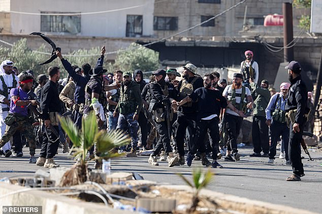Internal Security Forces officers escort a Druze prisoner and prevent him from being attacked by Bedouins on July 19