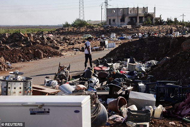 Confiscated stolen items are scattered at an Internal Security Forces checkpoint on July 19