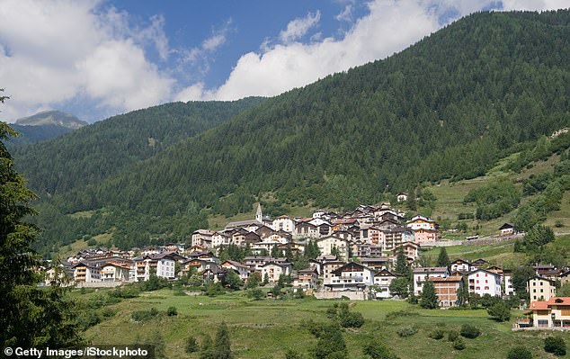 Pictured: summer view of Vermiglio, characteristic small town in Italian alps