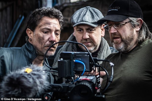 As well as a surprise appearance in a new drama series where he plays a grease-covered mechanic (pictured during filming)