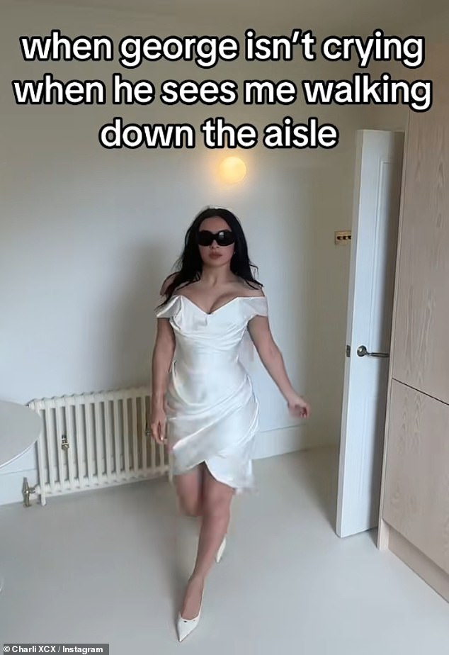 Later taking to TikTok Charli showed off her leggy wedding dress, which she teamed with shades, for the fun clip as she strutting into a room before turning on her heels and exiting