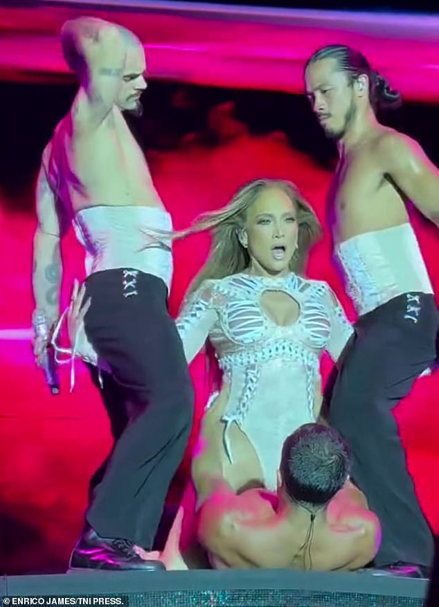 During another eye-popping moment, she straddled one dancer while placing her hands between the legs of another two