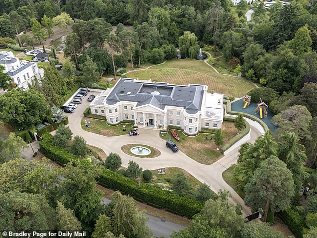 An aerial view of the mansion showing its grand driveway and extensive grounds