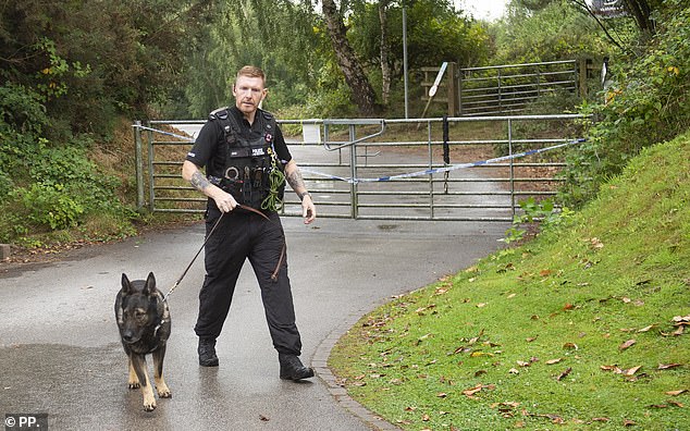 A police officer and dog join the search for missing mother-of-three Rachel Booth