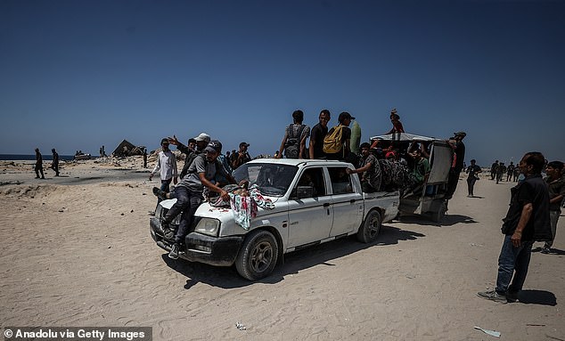 The Israeli military said its troops had fired warning shots towards a crowd of thousands in northern Gaza on Sunday to remove what it said was 'an immediate threat'