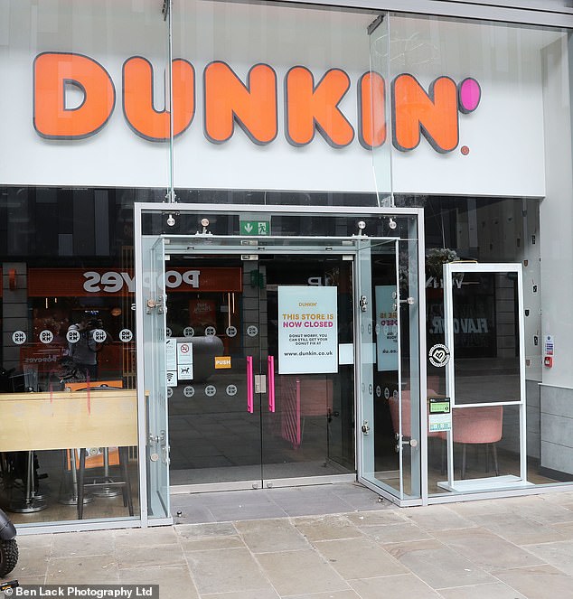 One the latest casualties of the slump has been Dunkin' Donuts, near the entrance to the Broadway. A sign on the door reads: 'This store is now closed'