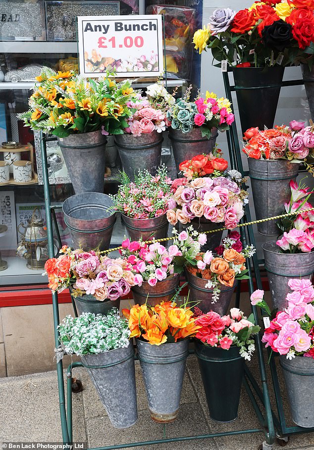 'Any bunch of flowers for £1' - another indication of the town's attraction to cheap consumer items