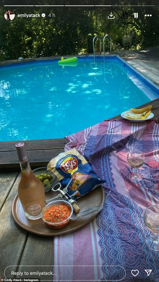 Emily and a shirtless Alistair enjoyed lollypops as they relaxed on the lawn before enjoying a glass of wine and a cooling soak in the pool