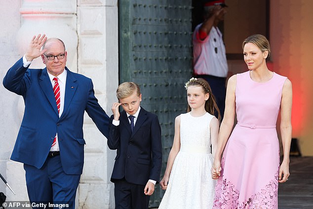 The glowing couple appeared to put all controversy behind them as they posed lovingly in a series of sweet snaps to commemorate the day he was bestowed power following the death of his father, Prince Rainier III in July 2005