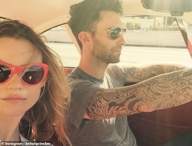 The model snapped a picture as they cruised in a car with Adam in the driver's seat