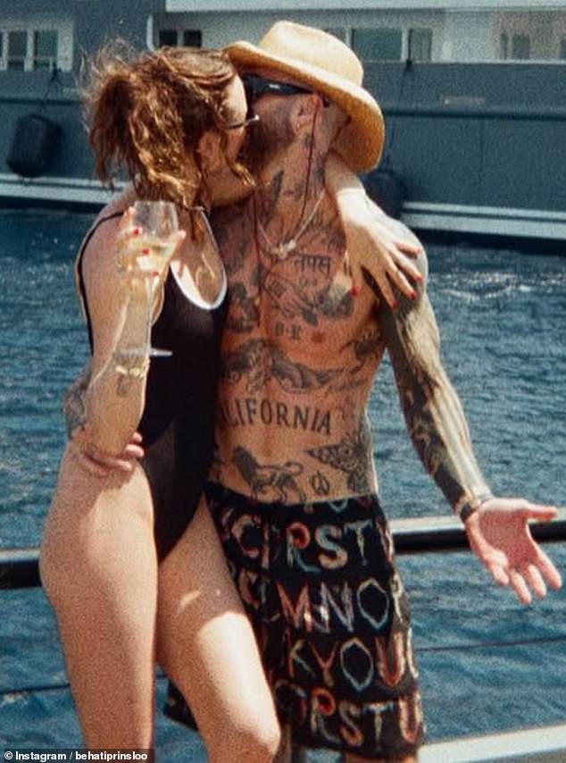 She captioned the carousel of images with: 'My person for life!!! 11 years today! @adamlevine deep sea baby¿.'