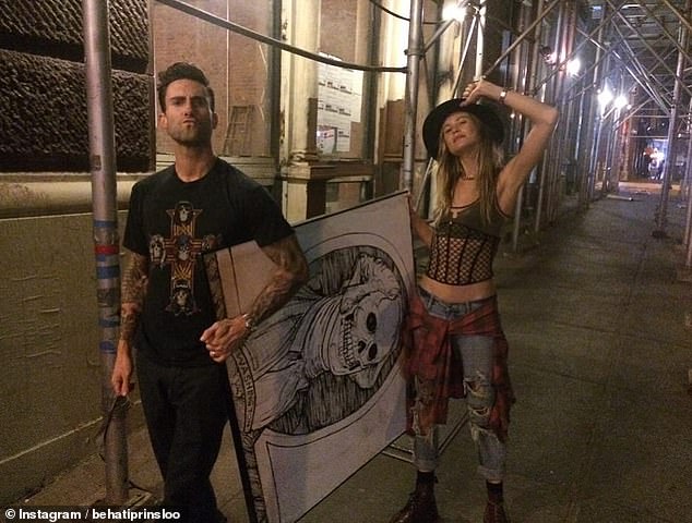 And one showed the two stars holding a drawing while strolling along the streets of New York City