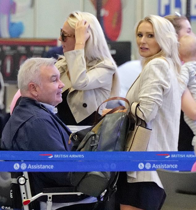 Eamonn, who uses a motorised wheelchair due to ongoing back problems, cut a causal figure in a pin striped shirt and dark trousers as he arrived at the airport