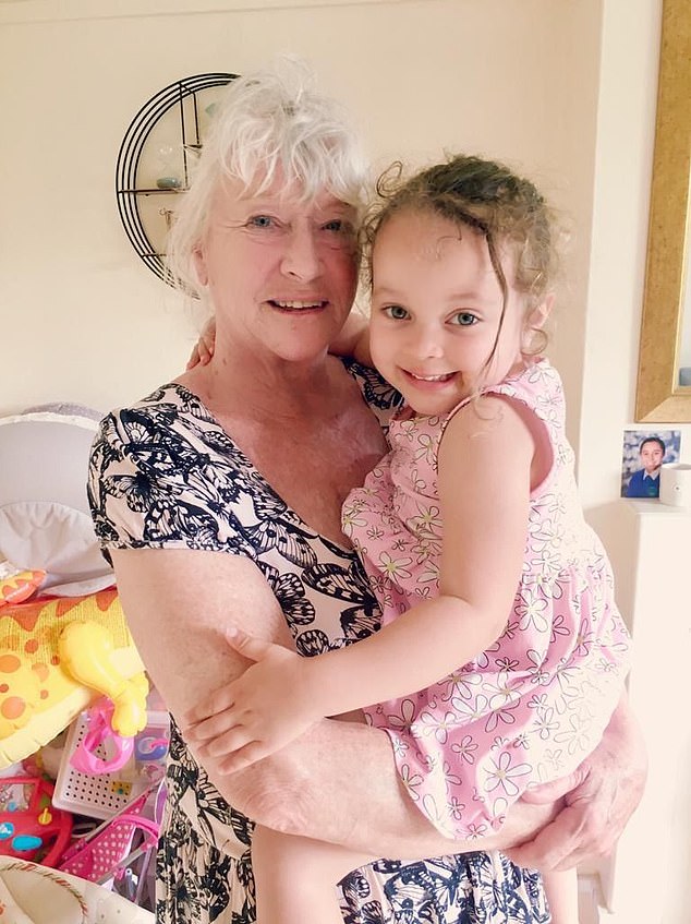 Maureen Findell, 76,has just sold her two-bedroom apartment in Punta Prima, on the Costa Blanca, after squatters 'completely ruined' the home for her and her family. Pictured: Maureen with her granddaughter